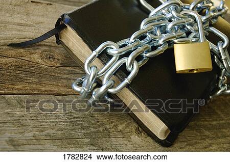 Book with chains View Large Photo Image Picture - Book with chains. Fotosearch