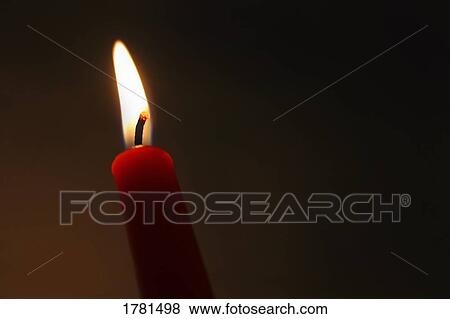 Candle burning View Large Photo Image Stock Photo - Candle burning. Fotosearch