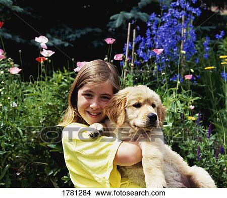 Child hugs pet dog View Large Photo Image Picture - Child hugs pet dog. Fotosearch