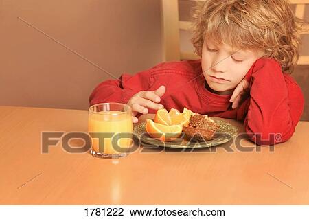 Stock Image - Child not hungry. Fotosearch