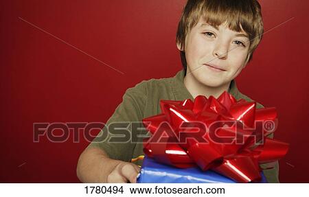 Picture - Child with gift. Fotosearch