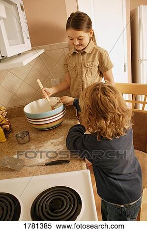 Children in the kitchen View Large Photo Image Stock Photography - Children in the kitchen. Fotosearch