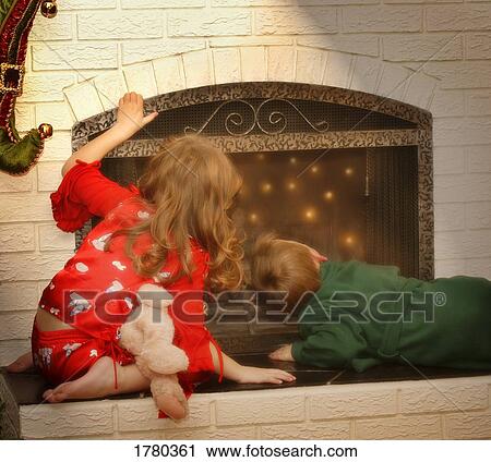 Stock Image - Children look for Santa. Fotosearch