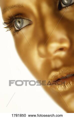 Closeup of a bronze face View Large Photo Image Stock Image - Closeup of a bronze face. Fotosearch