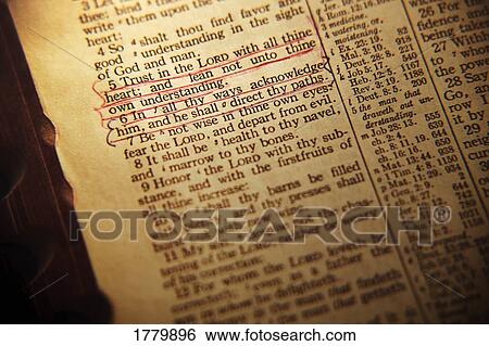 Stock Photograph - Closeup of Bible verse. Fotosearch