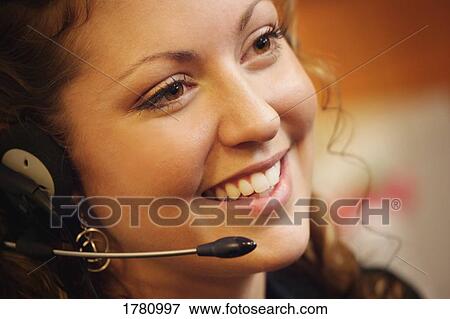 Closeup of woman with headset View Large Photo Image Stock Photo - Closeup of woman with headset. Fotosearch