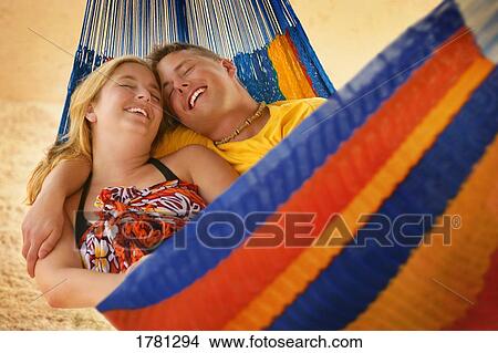 Picture - Couple enjoy a tropical vacation. Fotosearch