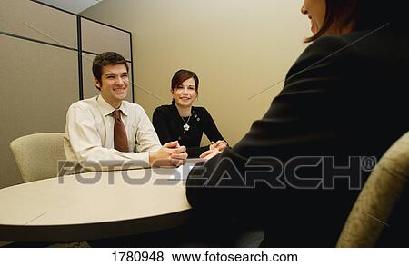 Couple in a meeting View Large Photo Image Stock Photo - Couple in a meeting. Fotosearch