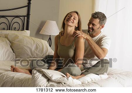 Couple in the bedroom View Large Photo Image Stock Image - Couple in the bedroom. Fotosearch