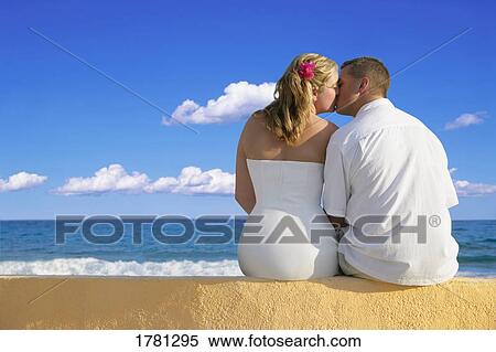 Couple kiss with ocean view View Large Photo Image Stock Photography - Couple kiss with ocean view. Fotosearch