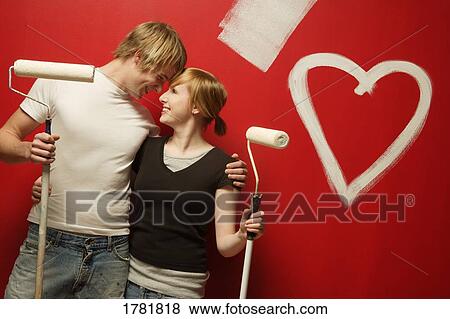 Couple painting together View Large Photo Image Stock Photo - Couple painting together. Fotosearch