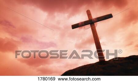 Cross on a hillside View Large Photo Image Stock Photo - Cross on a hillside. Fotosearch