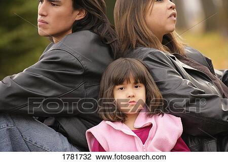 Stock Image - Daughter with parents. Fotosearch