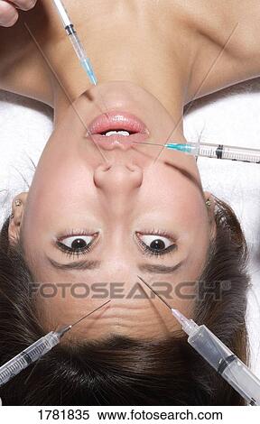 Doing anything for beauty View Large Photo Image Stock Photography - Doing anything for beauty. Fotosearch