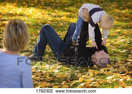 Family having fun View Large Photo Image Stock Image - Family having fun. Fotosearch