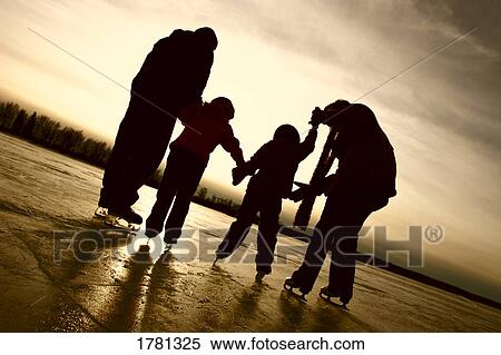 Family skating together View Large Photo Image Stock Photography - Family skating together. Fotosearch