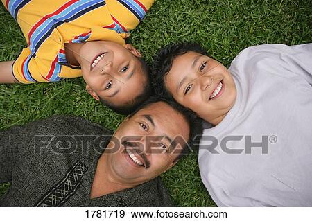 Father and two children View Large Photo Image Stock Photo - Father and two children. Fotosearch