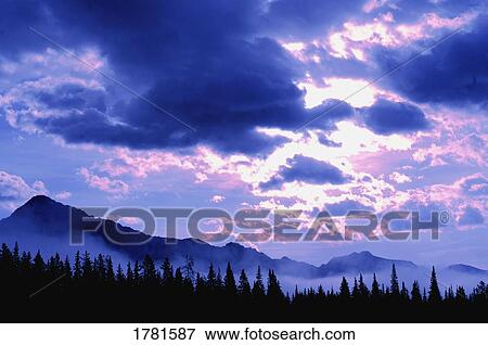 Foggy mountain peaks View Large Photo Image Stock Photo - Foggy mountain peaks. Fotosearch