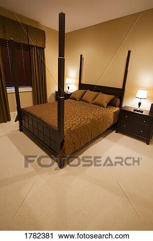 Stock Image - Four poster bed. Fotosearch