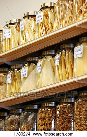 Picture - Full jars on shelf. Fotosearch