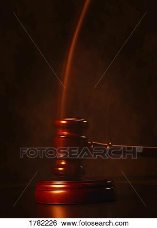 Stock Photograph - Gavel in motion. Fotosearch