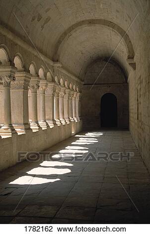 Gothic columns line corridor of Romanesque Abbey of Senanque View Large Photo Image Stock Image - Gothic columns line corridor of Romanesque Abbey of Senanque. Fotosearch