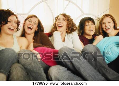 Stock Photography - Group of girls laughing together. Fotosearch