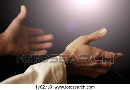 Stock Photo - Hands outstretched. Fotosearch