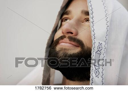 Jewish man wearing a tallis View Large Photo Image Stock Photograph - Jewish man wearing a tallis. Fotosearch