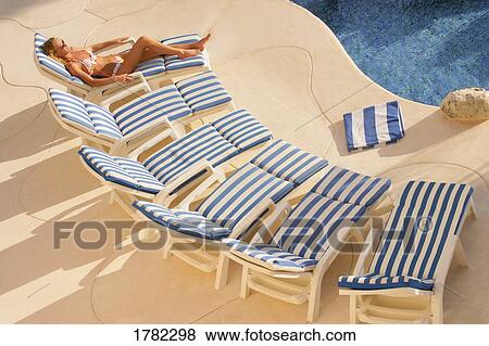 Lying in the sun View Large Photo Image Stock Photo - Lying in the sun. Fotosearch