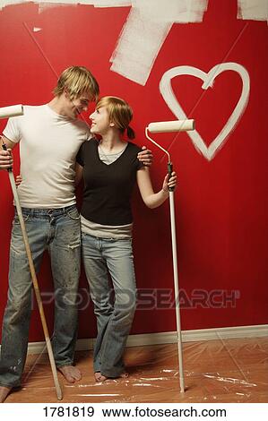 Man and woman painting together View Large Photo Image Stock Photo - Man and woman painting together. Fotosearch