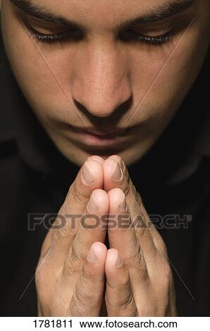 Man prays View Large Photo Image Stock Image - Man prays. Fotosearch
