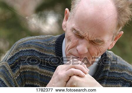 Man prays View Large Photo Image Stock Photo - Man prays. Fotosearch