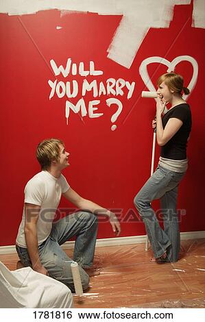 Man proposes creatively View Large Photo Image Stock Photograph - Man proposes creatively. Fotosearch