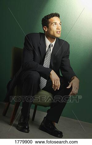 Man under a spotlight View Large Photo Image Stock Image - Man under a spotlight. Fotosearch