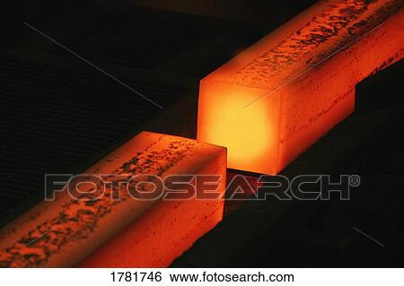 Melting steel in a molten steel factory View Large Photo Image Stock Photograph - Melting steel in a molten steel factory. Fotosearch