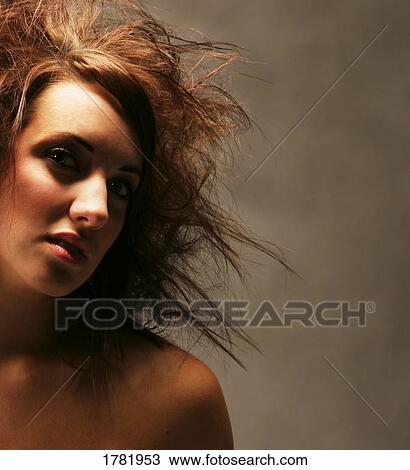 Stock Image - Model with trendy hair-style. Fotosearch