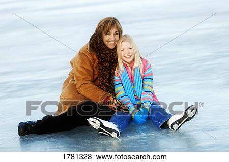 Stock Photo - Mother and daughter together. Fotosearch