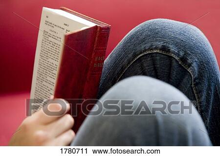 Stock Image - Reading the Bible. Fotosearch
