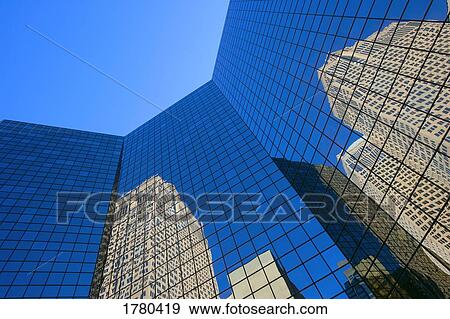 Reflection of high-rise buildings View Large Photo Image Stock Photo - Reflection of high-rise buildings. Fotosearch