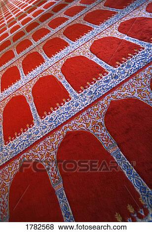 Stock Photo - Repeating pattern on red carpet. Fotosearch