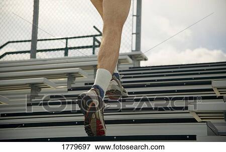 Running up the stairs View Large Photo Image Stock Photo - Running up the stairs. Fotosearch