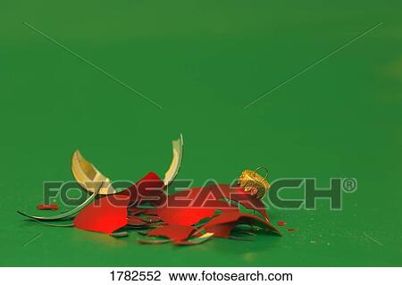 Stock Image - Shattered Christmas ornament. Fotosearch