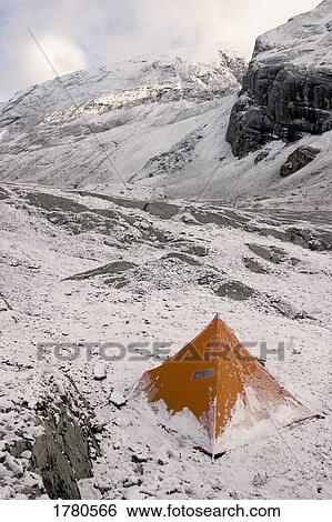 Stock Photograph - Snow tent on mountain. Fotosearch