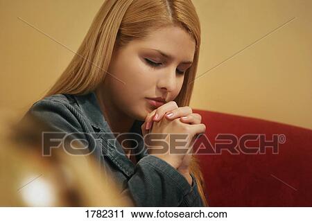 Teenager prays View Large Photo Image Stock Image - Teenager prays. Fotosearch