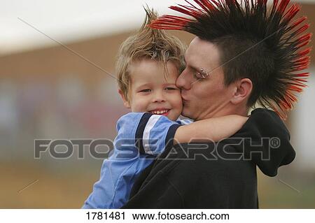 Teenager with young boy View Large Photo Image Stock Image - Teenager with young boy. Fotosearch