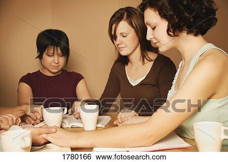 Teenagers praying together View Large Photo Image Stock Photograph - Teenagers praying together. Fotosearch