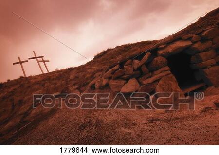 Picture - The cross and an empty tomb. Fotosearch