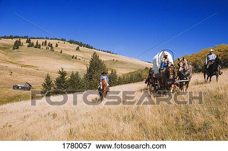Traveling by horseback View Large Photo Image Stock Photo - Traveling by horseback. Fotosearch
