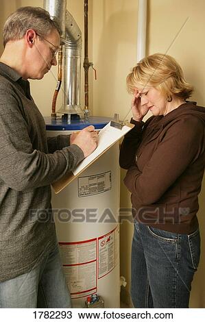 Trouble with the hot water tank View Large Photo Image Stock Image - Trouble with the hot water tank. Fotosearch